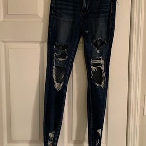 American Eagle distressed raw hem skinny jeans